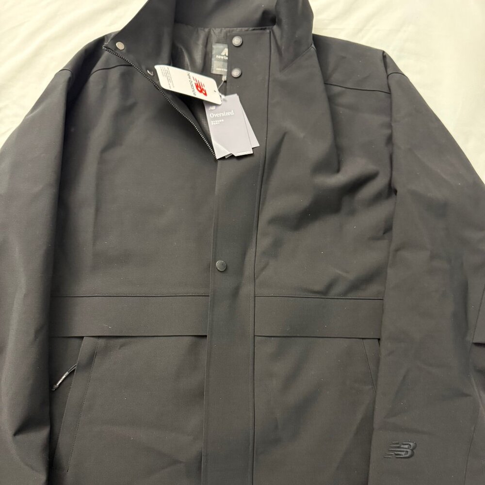 Men’s New Balance jacket, brand new with original tags. price $160